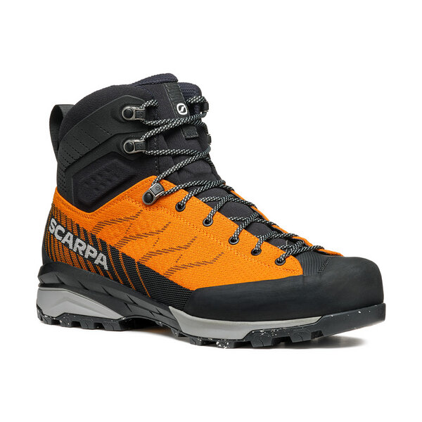 Trekking boot Mescalito Trk Planet Gtx, orange and black, featuring sustainable materials and Vibram® Ecostep Evo sole.