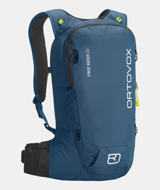 Compact and ergonomic blue 'Free Rider 22' freeride backpack with flexible design and secure fit.