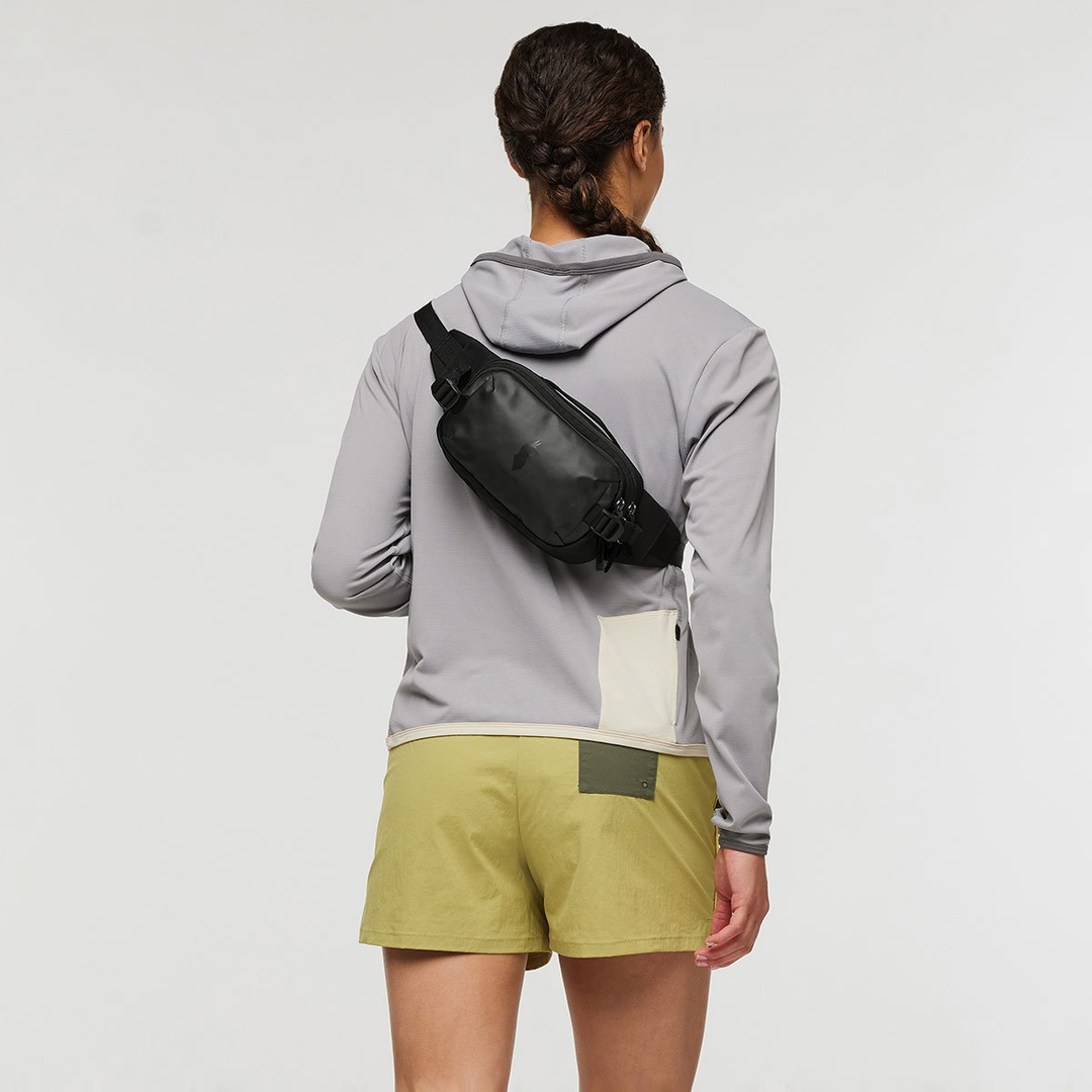 Allpa X 1.5L Hip Pack worn by person, ideal for travel and outdoor exploration.