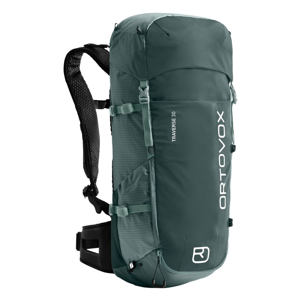 Versatile green Traverse 30 alpine backpack with ergonomic straps, recycled materials, and multiple compartments for mountain adventures.
