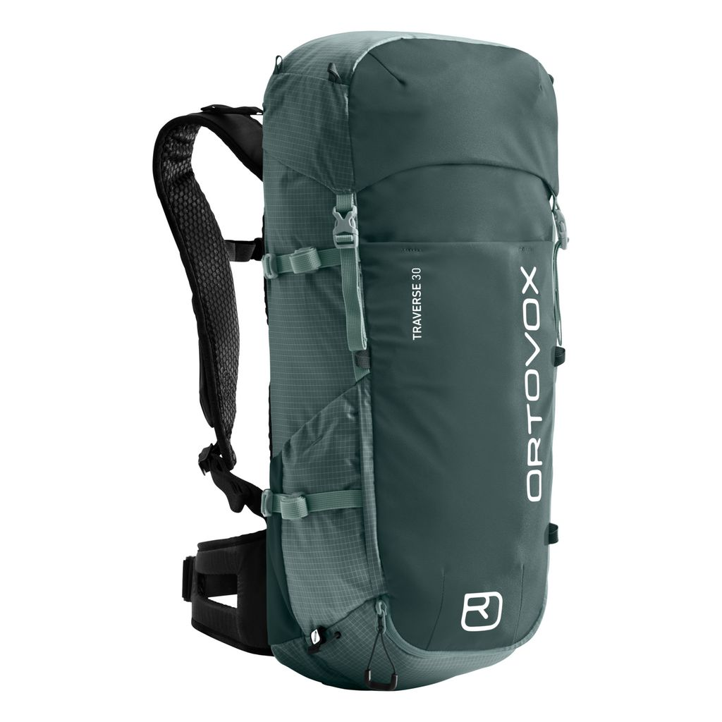 Versatile green Traverse 30 alpine backpack with ergonomic straps, recycled materials, and multiple compartments for mountain adventures.
