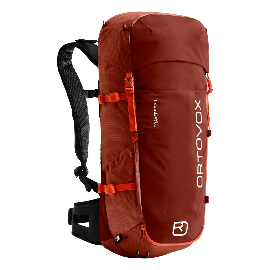 Versatile alpinist backpack Traverse 30 in red, featuring ergonomic shoulder straps and multiple attachment options for alpine adventures.