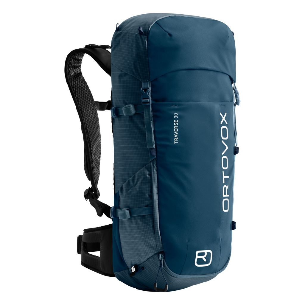 Versatile blue Traverse 30 backpack designed for alpine adventures.