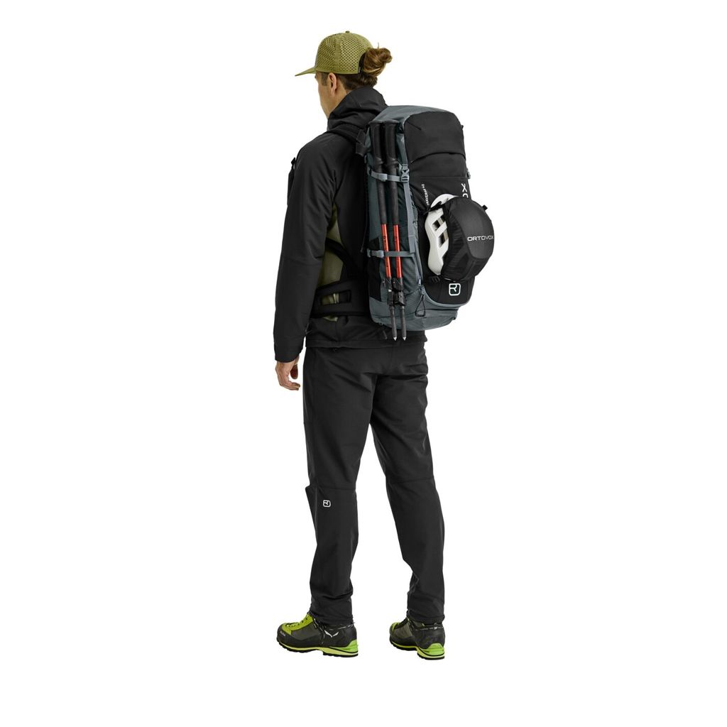 Versatile Traverse 40 backpack for alpine adventures, made with recycled polyamide and ergonomic design.