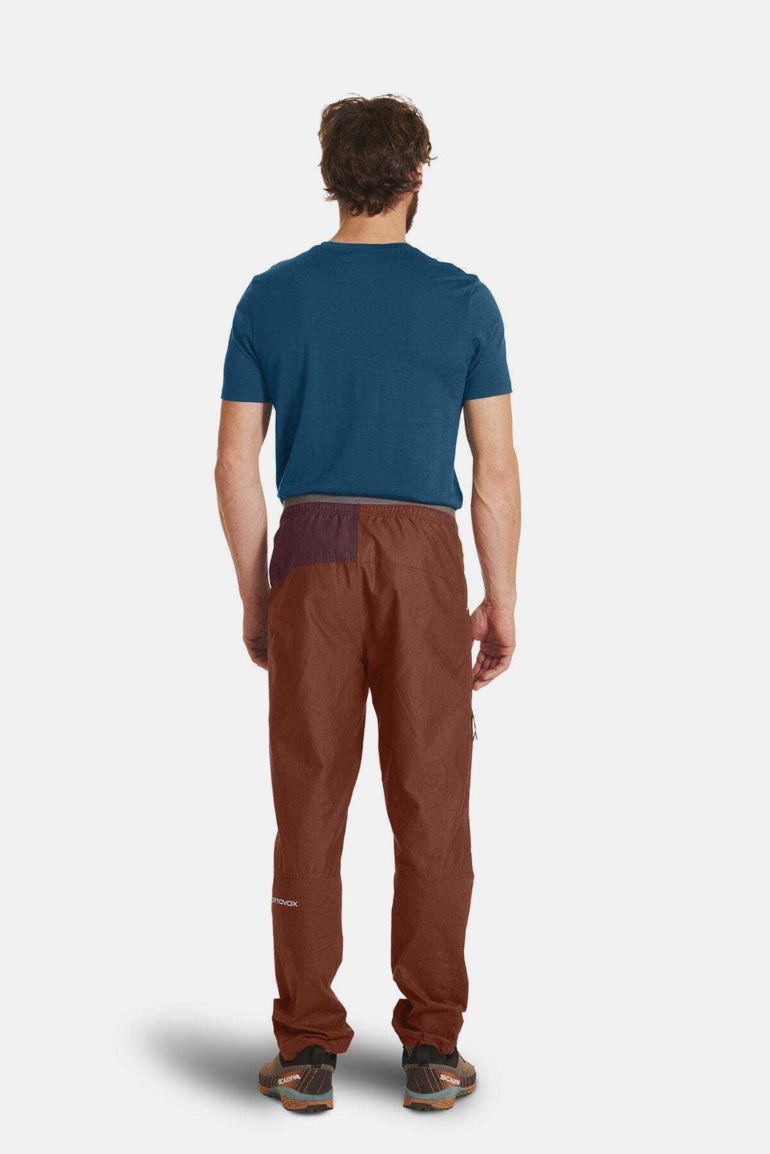 Valbon Pants M in brown, rear view; organic cotton and hemp blend, elastic waistband, designed for climbing.