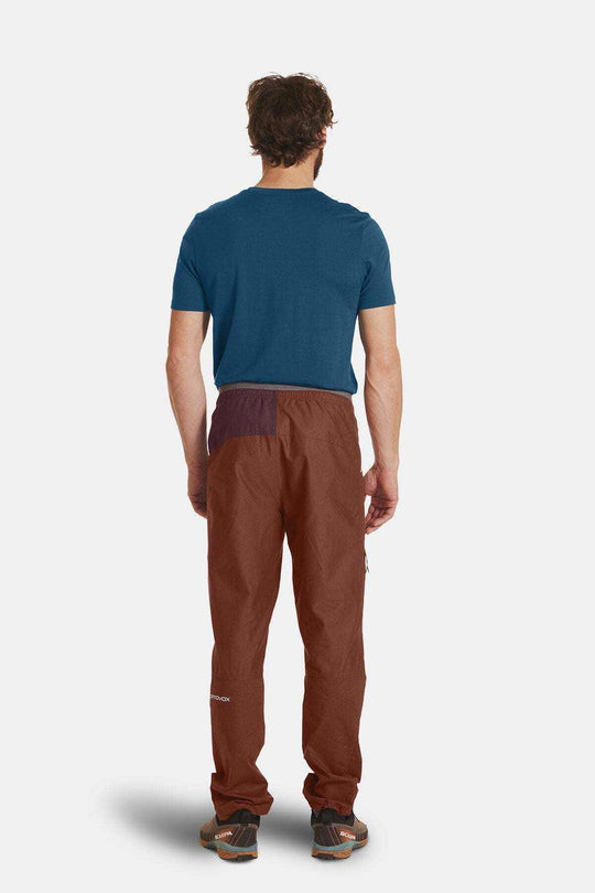 Valbon Pants M in brown, rear view; organic cotton and hemp blend, elastic waistband, designed for climbing.