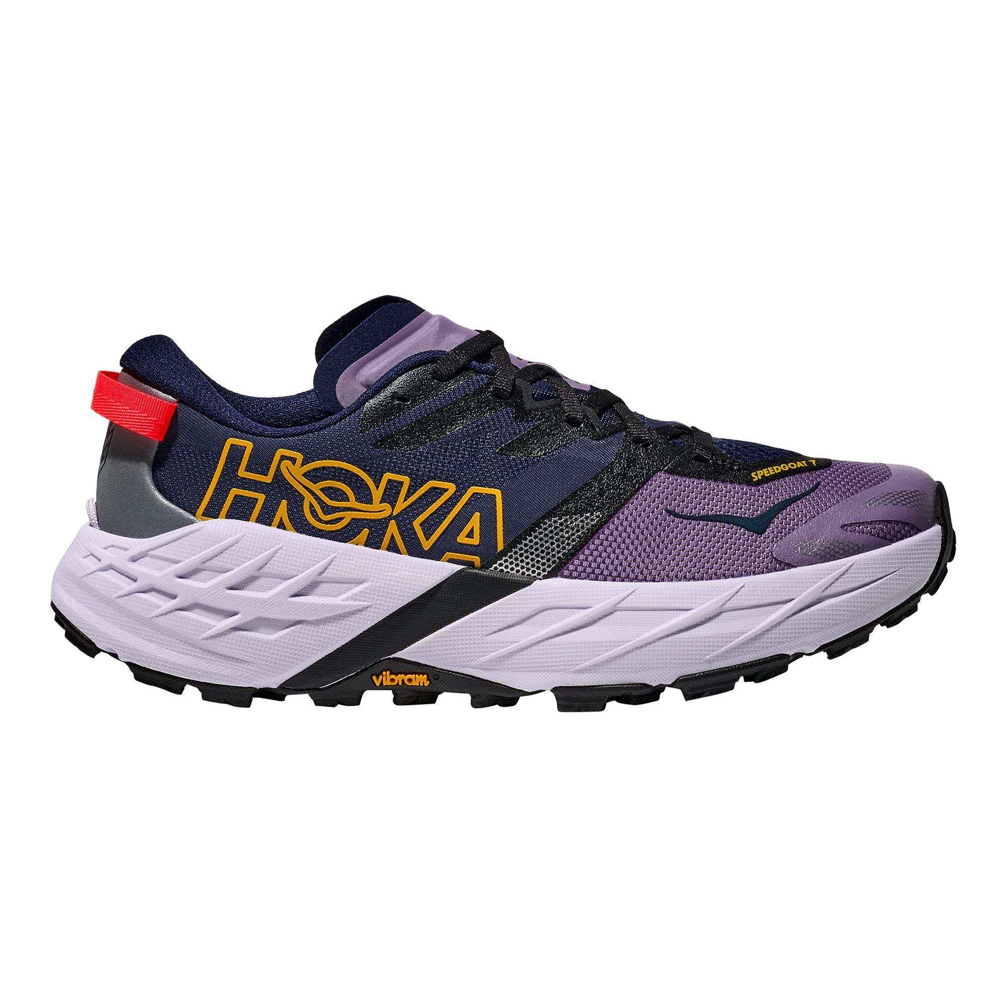 W Speedgoat 7 trail running shoe with Vibram Megagrip sole, integrated gaiter, and enhanced comfort features.