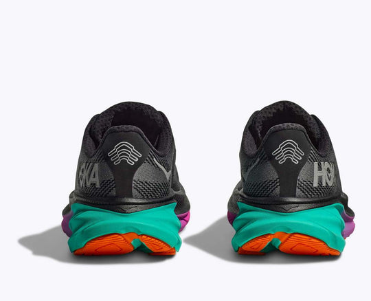 Clifton 9 Gtx sneakers with vibrant colored soles, featuring reflective details and mesh material.