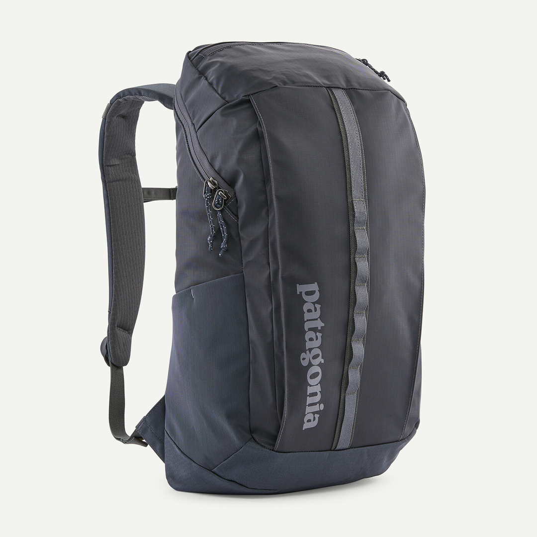 Black Hole Pack 25L durable backpack with recycled materials and multiple compartments.