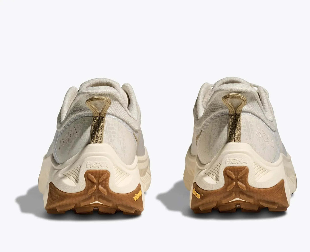 Transport 2 sneaker with recycled polyester mesh, sugarcane EVA midsole, Vibram EcoStep sole, quick elastic lacing, and 360° reflectivity for urban and trail comfort
