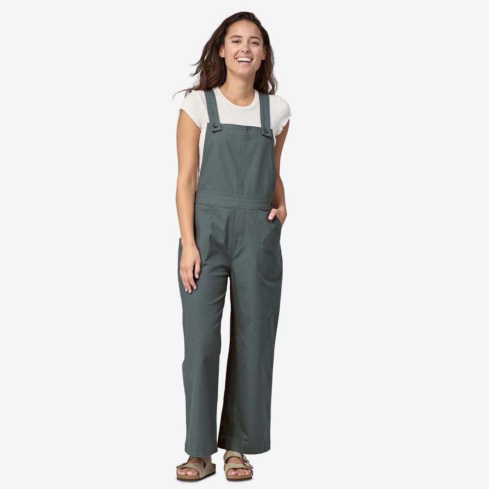 Women's cropped overalls, comfortable and versatile, made from organic cotton blend fabric, garden-ready design with adjustable straps and multiple pockets.