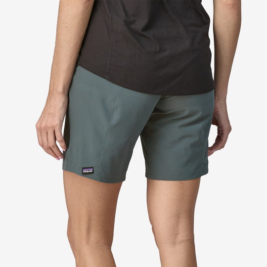 Women's Tyrolean Bike Shorts with elastic waistband, durable green fabric, and versatile fit for outdoor adventures.