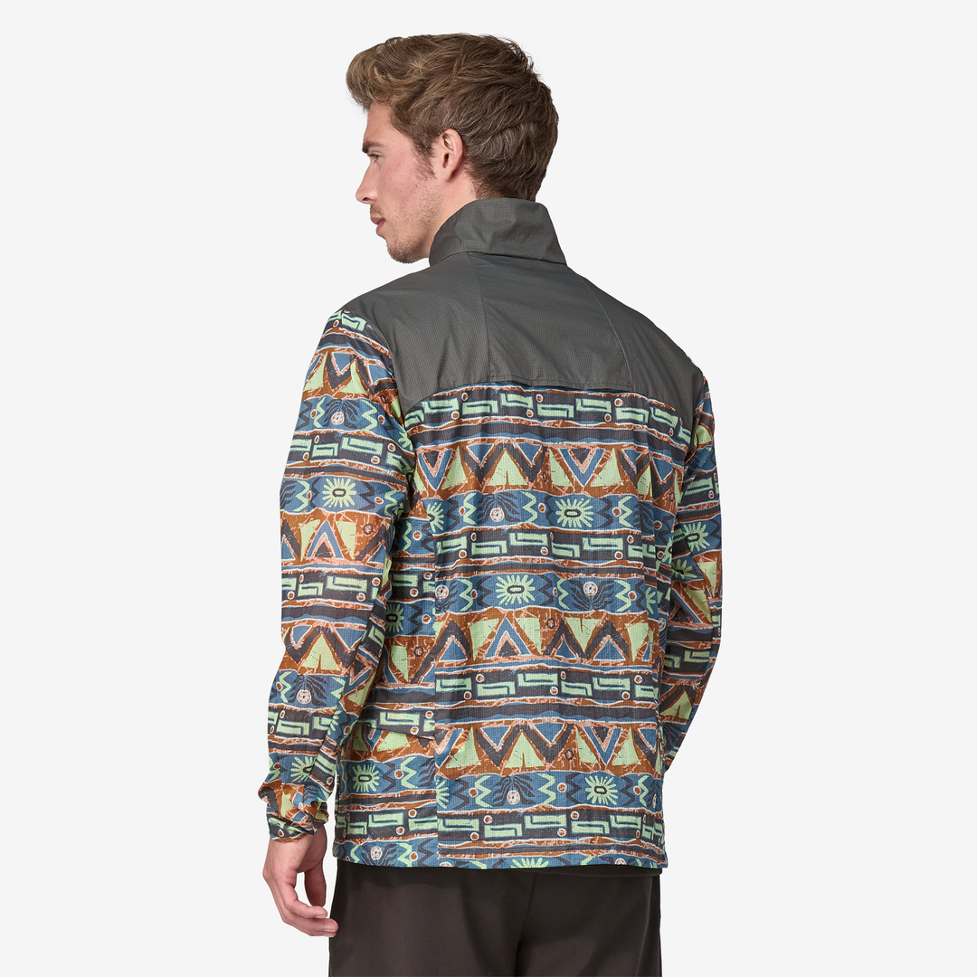 Houdini Stash Zip windbreaker in patterned design, lightweight recycled nylon, side pockets, semi-integral zip, ventilation openings.