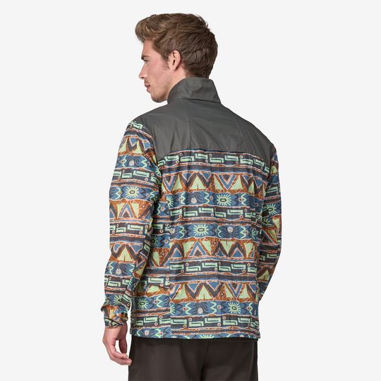 Houdini Stash Zip windbreaker in patterned design, lightweight recycled nylon, side pockets, semi-integral zip, ventilation openings.