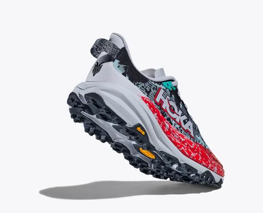 Trail running shoe HOKA W Speedgoat 6, featuring breathable upper, aggressive traction, and lightweight design for technical terrains.