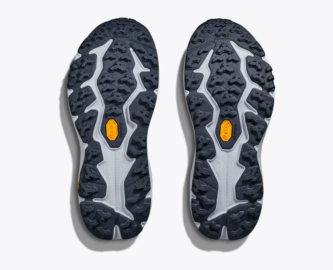 Speedgoat 6 trail running shoe sole with Vibram® Megagrip and 5 mm lugs for technical terrain traction.