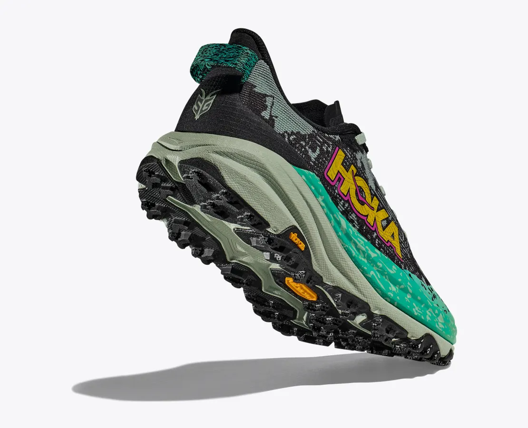 Trail running shoe "Speedgoat 6" with aggressive traction, lightweight materials, and breathable upper.