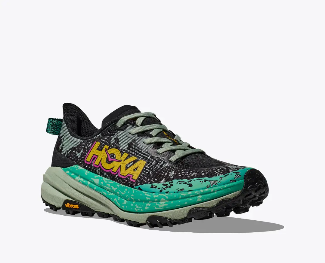 Trail running shoe Speedgoat 6 in green and black with Vibram® Megagrip sole and lightweight breathable upper.