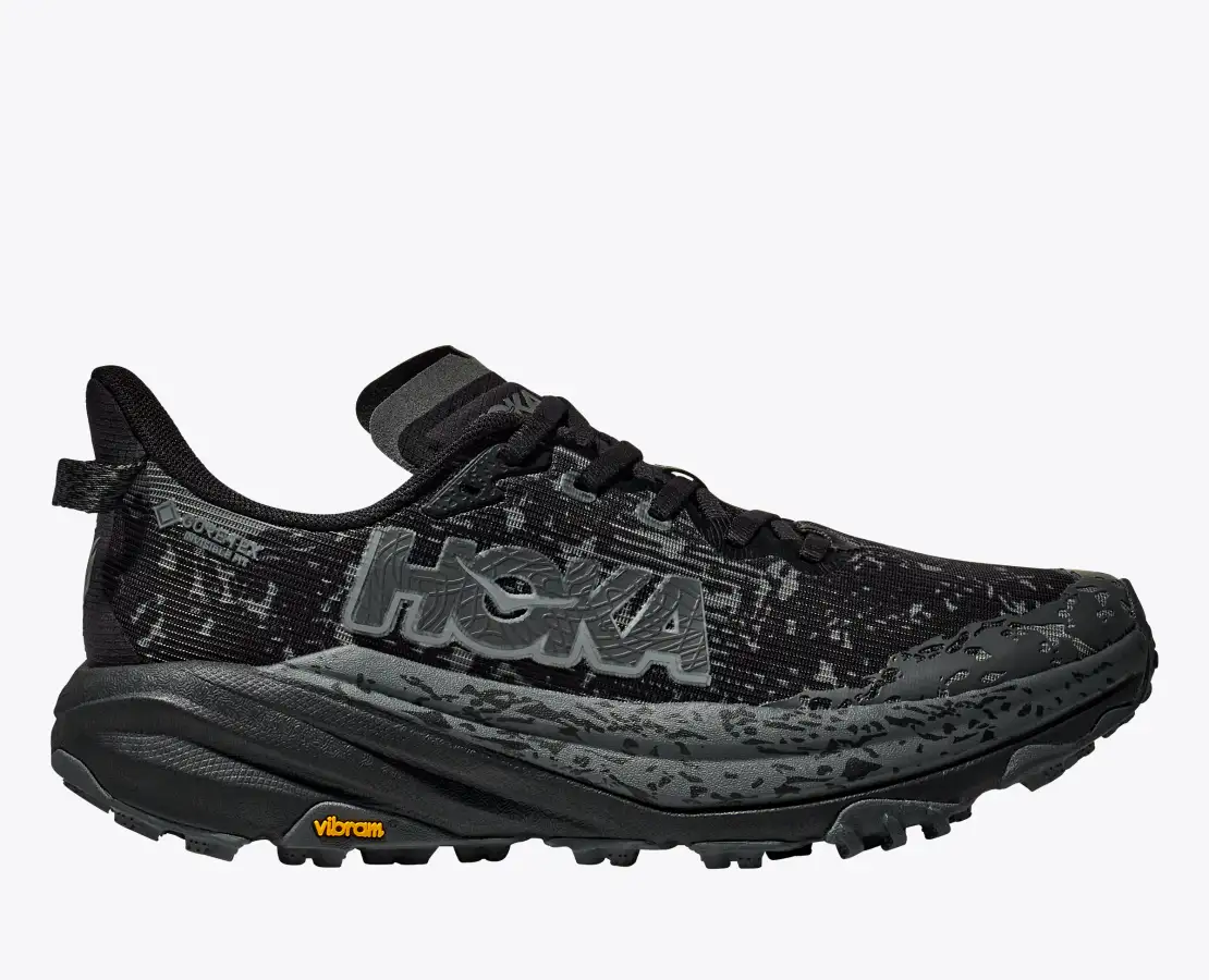 Trail running shoe Speedgoat 6 GTX with GORE-TEX, Vibram® Megagrip sole for traction, and reinforced heel for wet conditions.