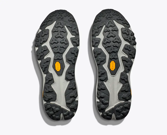 Trail running shoes with Vibram® Megagrip outsole; Speedgoat 6 Gtx for wet conditions.