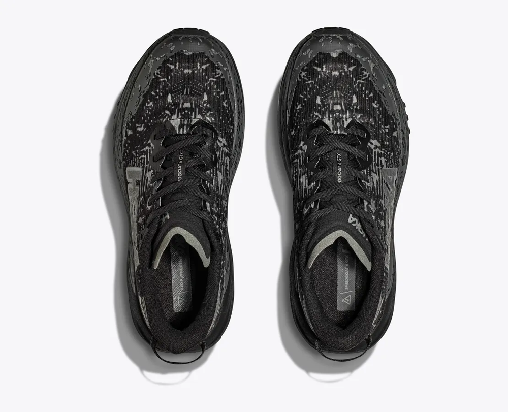 Women's Hoka Speedgoat 6 GTX trail shoes with GORE-TEX Invisible Fit, black design.