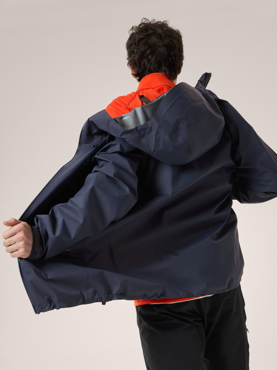 Beta SL Jacket M in blue, showcasing its lightweight, waterproof, and breathable design with helmet-compatible StormHood.