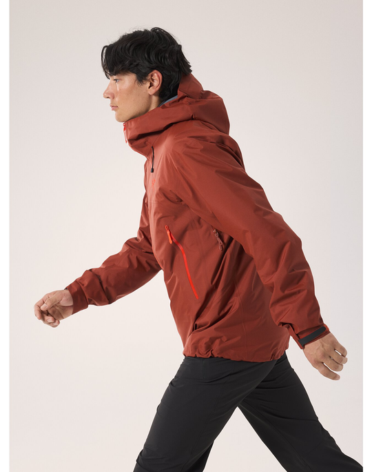 Beta SL Jacket M in red, featuring lightweight and breathable GORE-TEX ePE, shown on a person moving forward.