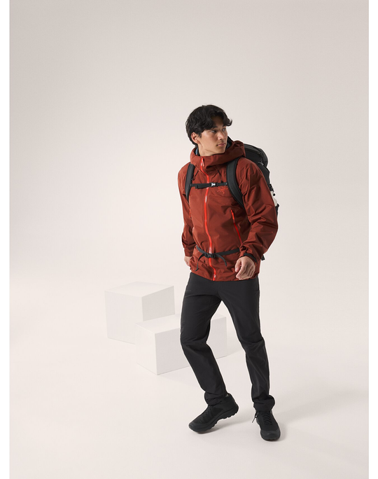 Beta SL Jacket M in outdoor setting, lightweight red jacket with helmet-compatible hood, ideal for mountain weather protection.