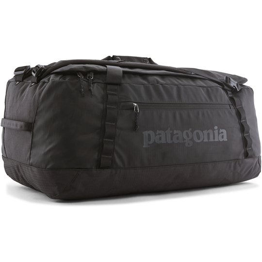 Black Hole Duffel 70L bag made from recycled material, featuring durable, water-repellent fabric, ergonomic removable straps, and multiple storage options.