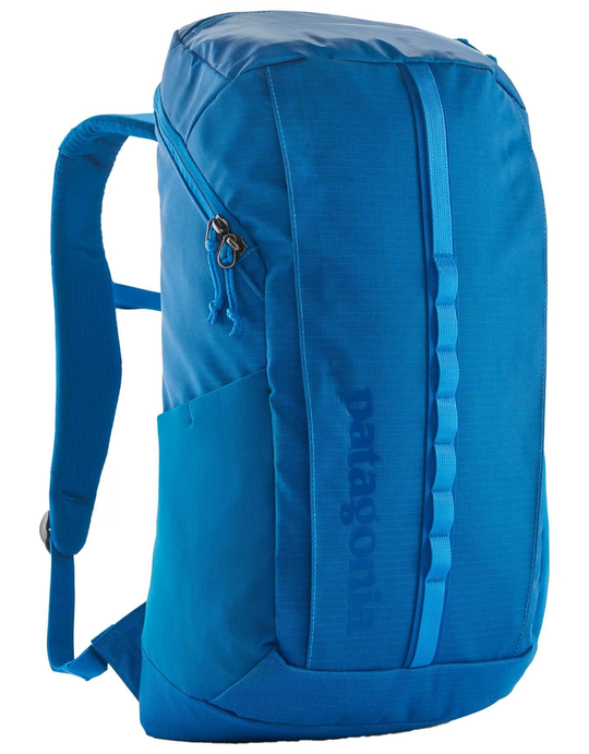 Black Hole Pack 25L backpack in blue color with durable recycled polyester fabric, front storage pocket, breathable back panel, and elastic side pockets.