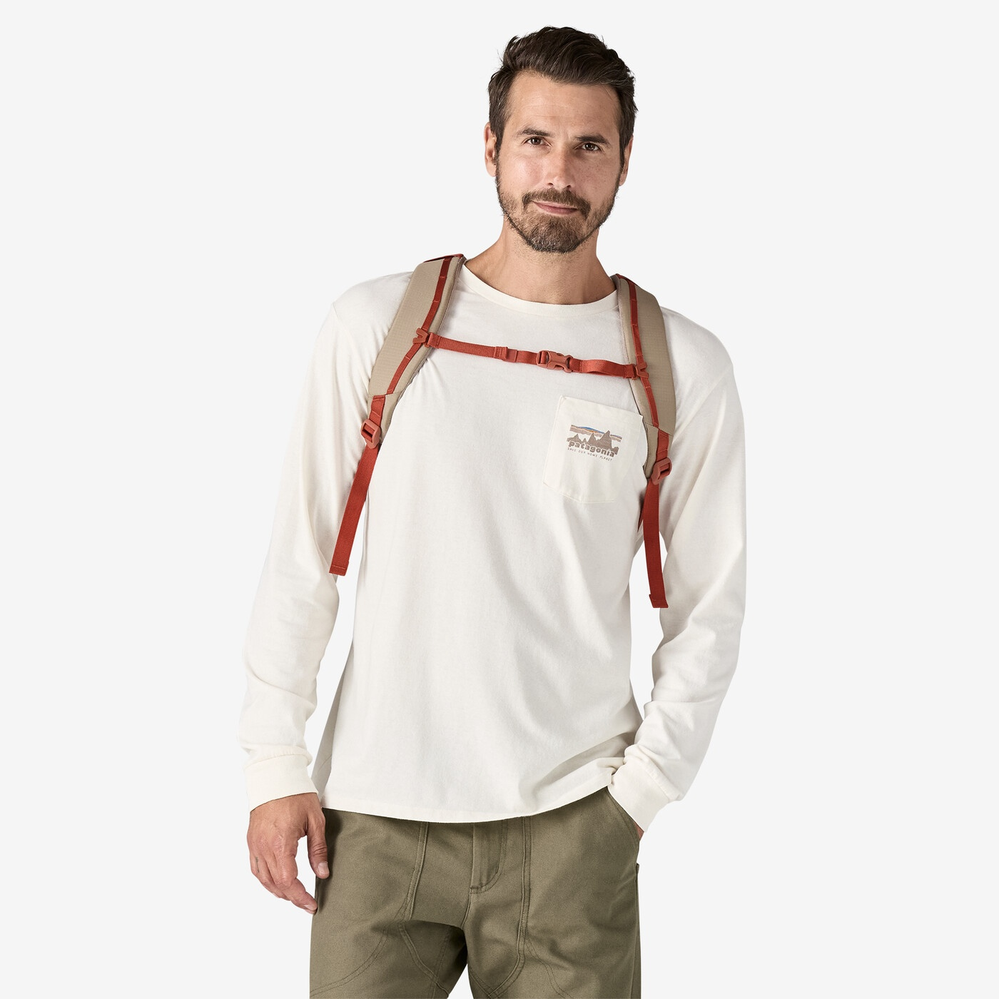 Refugio Day Pack 26L worn by a person, showing front straps and casual attire.