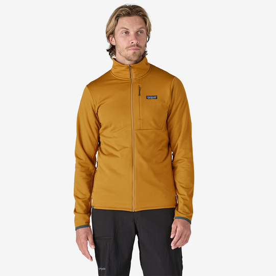 Thermal jacket for alpine goals featuring wind-resistant exterior and breathable interior.