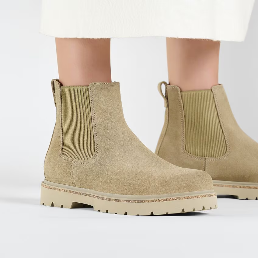 Suede leather women’s Highwood slip-on Chelsea boots with cork elements and rubber sole.
