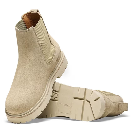 Suede leather women's slip-on boots with cork elements and rubber sole.