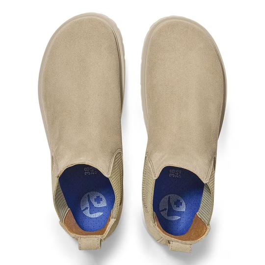 Suede leather slip-on shoes for women with cork sole and Deep Blue footbed.