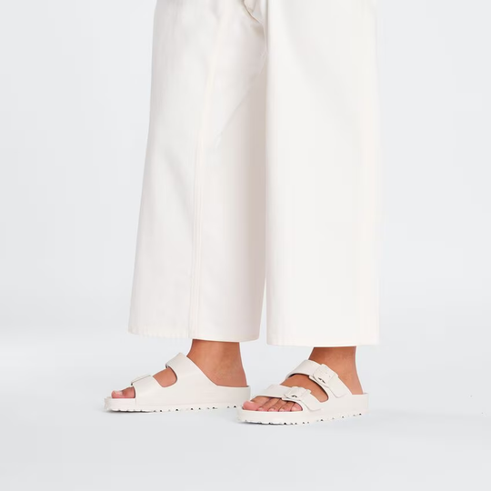 BIRKENSTOCK Arizona sandals in white EVA, featuring a lightweight, waterproof design with an anatomical footbed.
