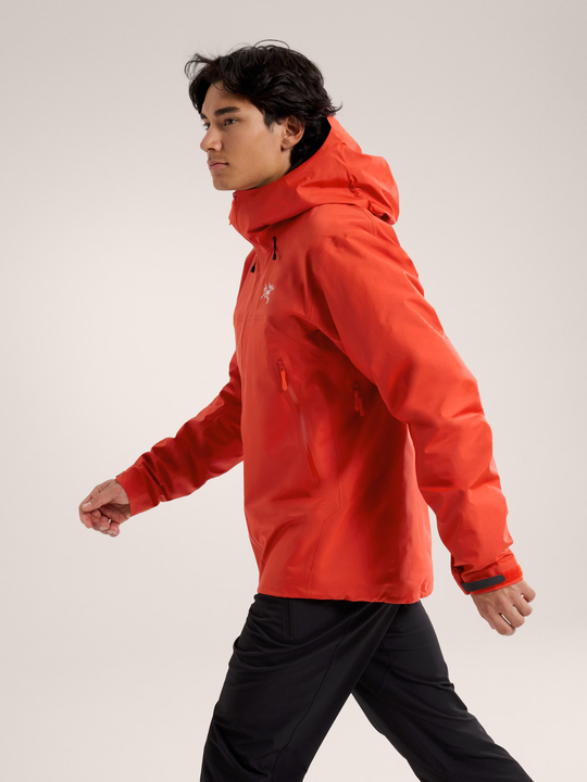 Beta SL Jacket M in bright orange, featuring lightweight GORE-TEX ePE fabric with StormHood, designed for mountain conditions.