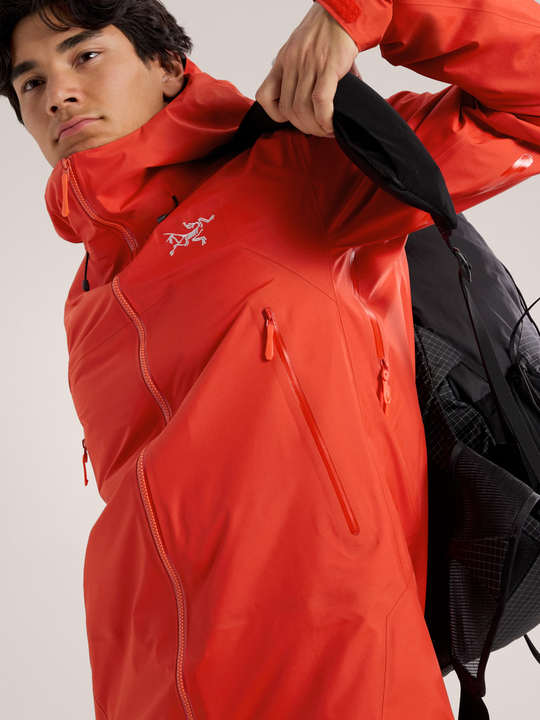 Beta SL Jacket M in red, featuring lightweight GORE-TEX fabric with StormHood for mountain protection.