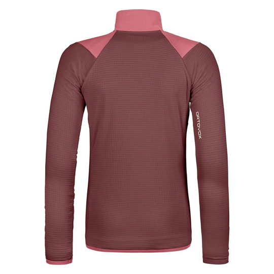 Women's technical fleece grid jacket with merino wool, breathable fabric, and chest pockets for mountain hiking.
