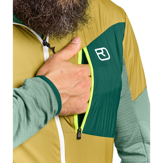 Ladiz Hybrid Jacket with chest pocket detail and contrasting colors in alpine design.