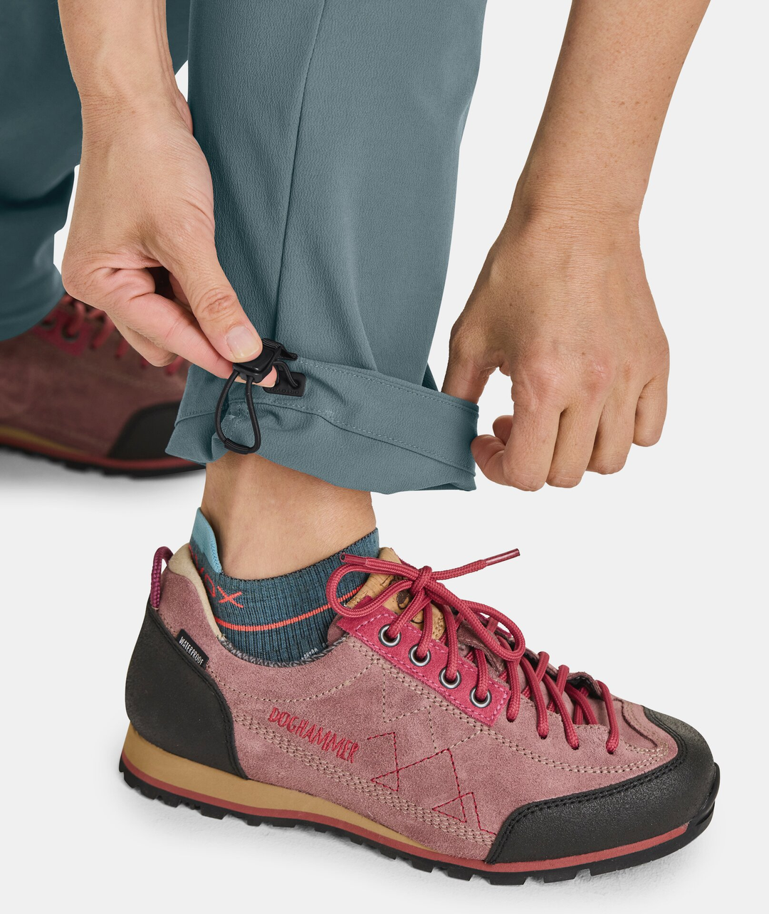 Women's Pala Pants with adjustable hem, durable alpine climbing wear.