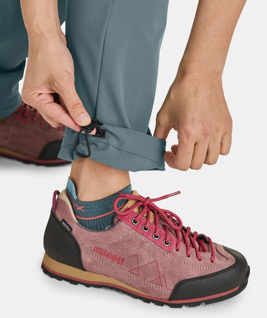 Women's Pala Pants with adjustable hem, durable alpine climbing wear.
