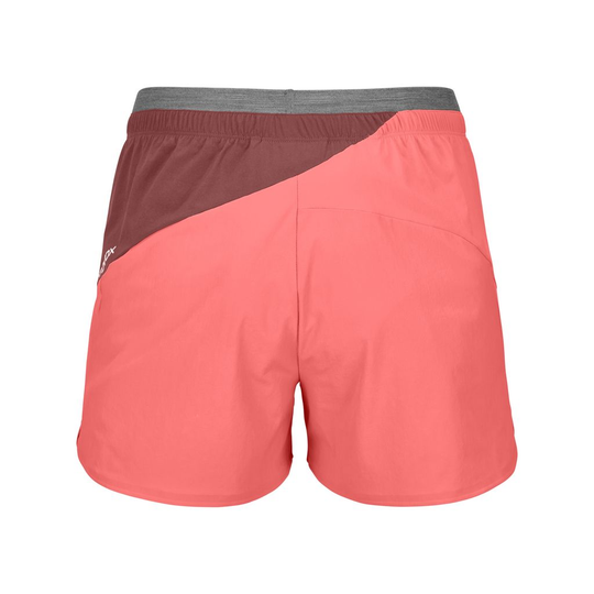 Women's Piz Selva Shorts in coral pink, lightweight design with elastic Merino waistband for comfort and breathability.