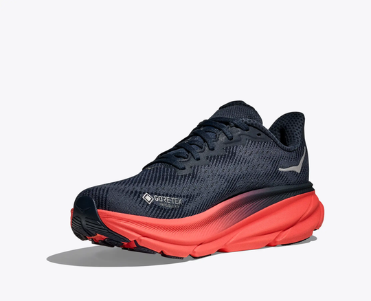Clifton 9 Gtx running shoe with GORE-TEX, black mesh upper, and orange sole for all-weather traction.