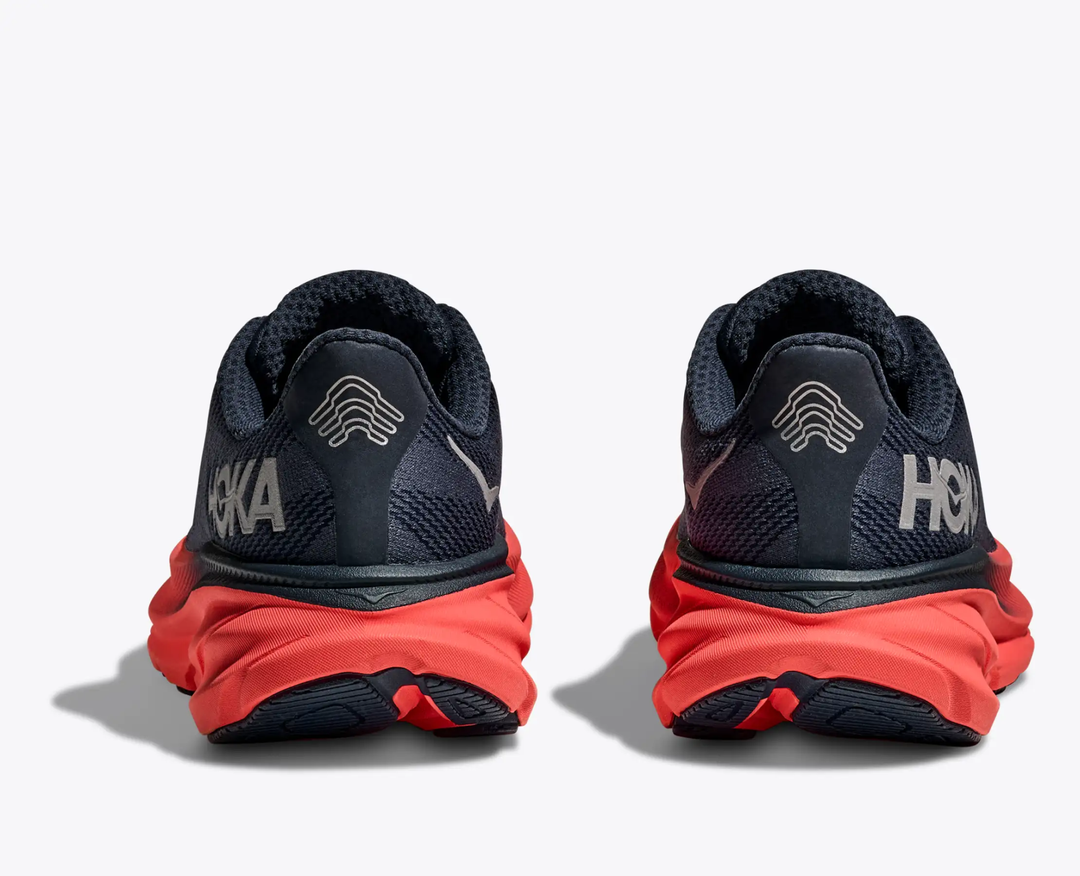 Hoka Clifton 9 GTX running shoes with reflective design and durable sole for all-weather conditions.