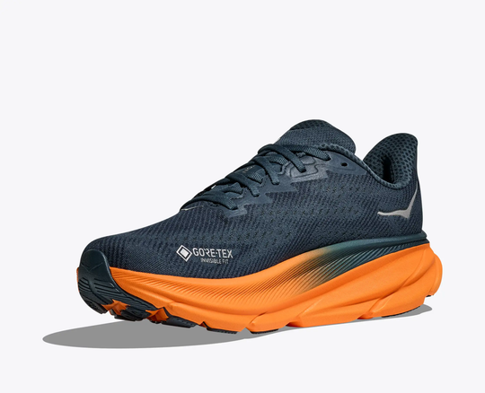 Clifton 9 Gtx shoe with GORE-TEX Invisible Fit, black mesh upper, orange sole, designed for wet conditions.