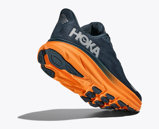 Clifton 9 Gtx running shoe with GORE-TEX and orange sole.