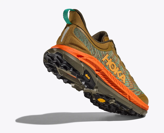 Mafate Speed 4 trail running shoe with breathable jacquard mesh, PROFLY midsole, and Vibram® Megagrip outsole in green and orange design.
