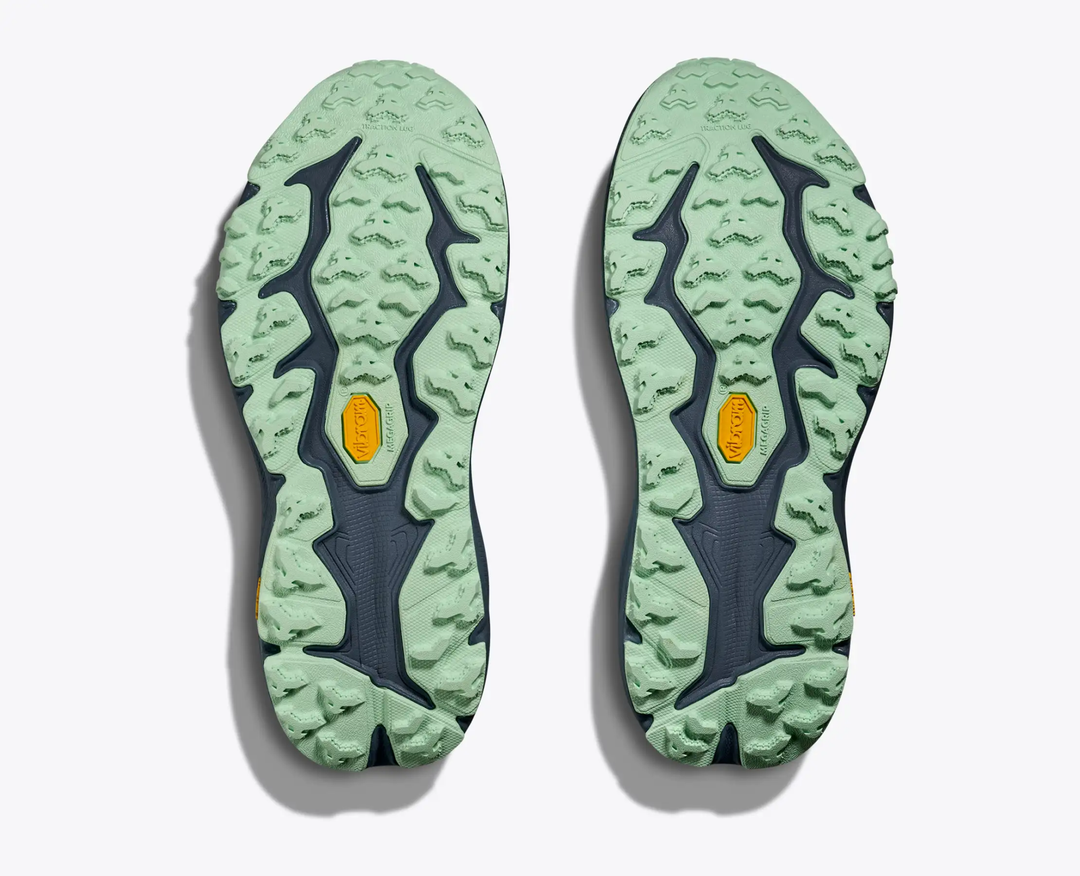 Sole of Speedgoat 6 trail-running shoes, featuring Vibram Megagrip with Traction Lug design.
