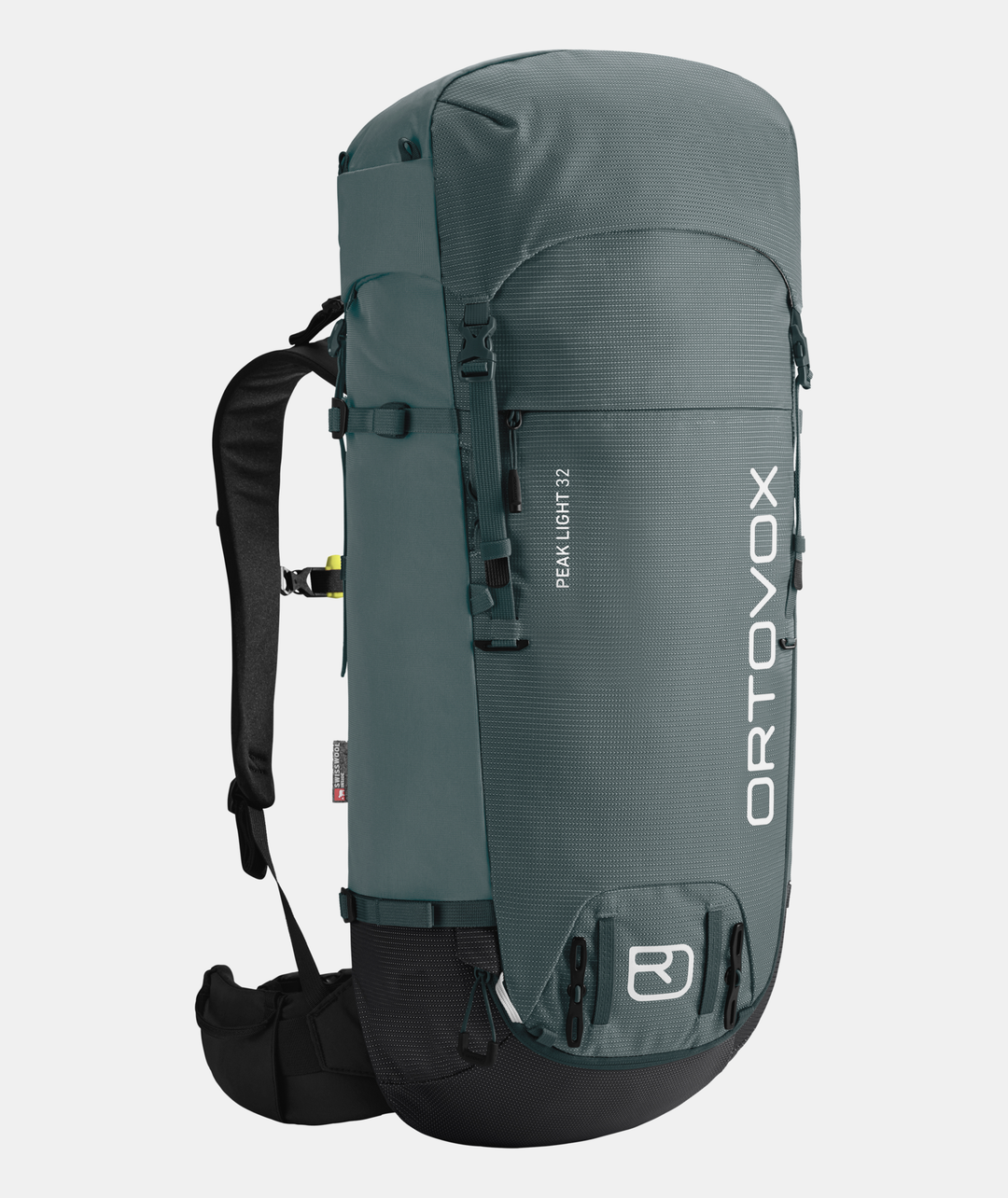 Peak Light 32 backpack for alpine trekking, featuring a lightweight, sustainable design with Swisswool Hybrid Back System.